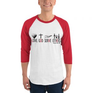 Red and white 3/4 sleeve shirt with slogan on front.